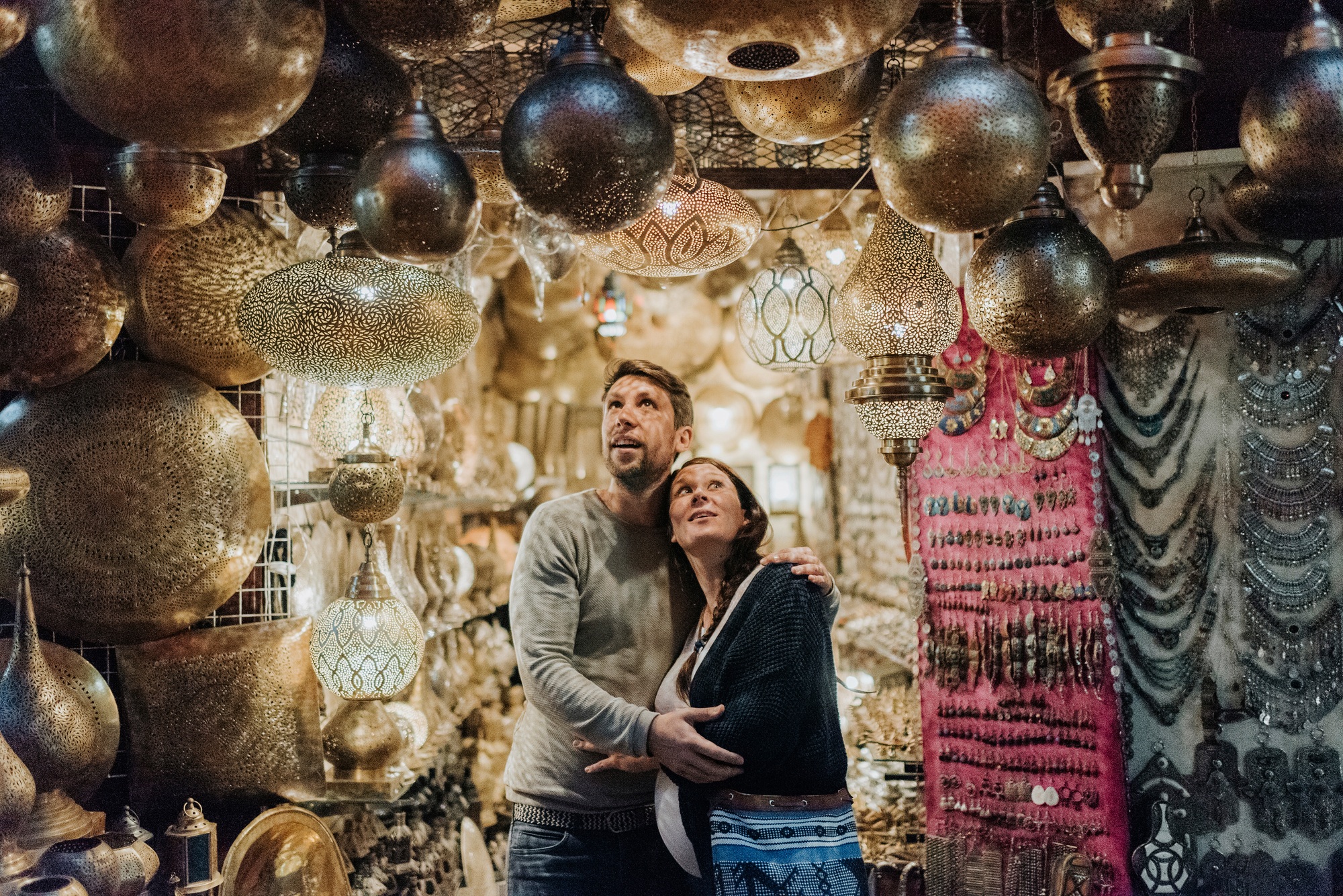 Pregnant couple in souk, Marrakech, Morocco